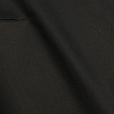 KOS CO COTTON POP LIKRA L BLACK širine 1.5 m, gramaže 118 g/m2. Pamučni košuljarac sa elastinom, lagan i udoban, sezona Proleće Leto.