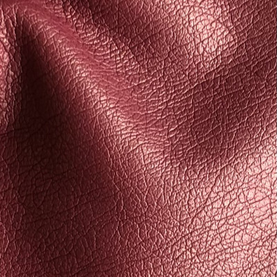 KOZA VIS LEATHER BONDED BURGUNDY širine 1.4 m, gramaže 311 g/m2. Veštačka koža sa mat sjajem i reljefastom teksturom, za šivenje pantalona, haljina.