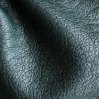 KOZA VIS LEATHER BONDED GREEN JET SET širine 1.4 m, gramaže 311 g/m2. Veštačka koža sa mat sjajem i reljefastom teksturom, za šivenje pantalona, haljina.