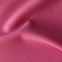 05021207-63 - STOF P MELONI AZALEA PINK širine 1.5 m, gramaže 208 g/m2. Univerzalna poliesterska tkanina sa crep tkanjem, lepim padom, mekana na dodir. 